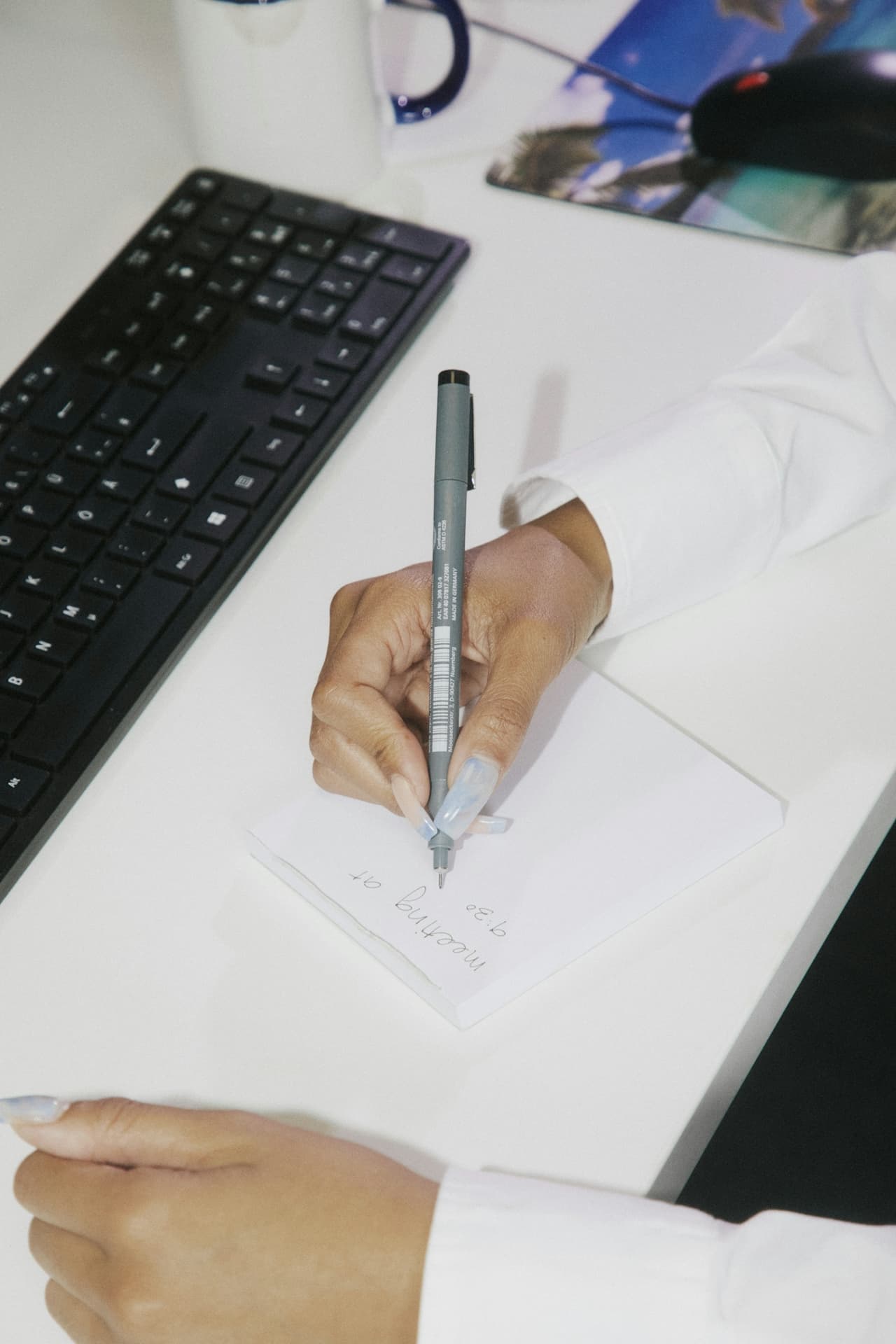 Writing notes at a desk