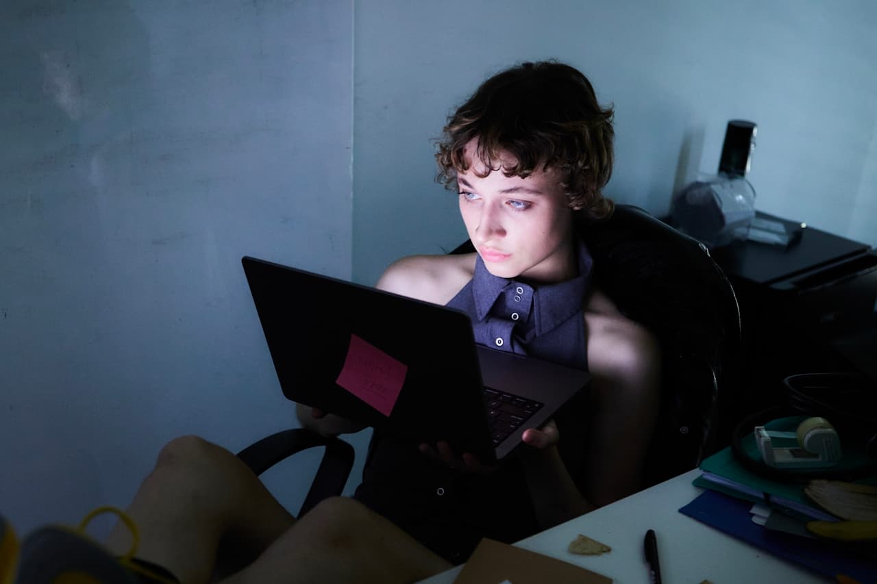 Focused work session at desk with laptop